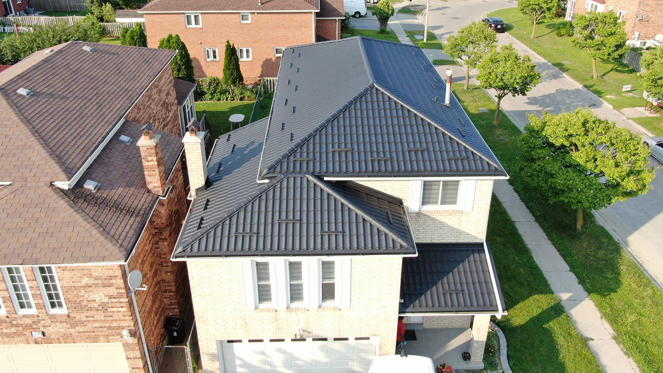 Black Metal Roofing Installation on Home in Scarborough